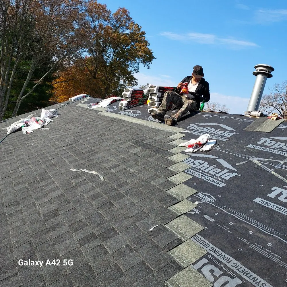 Slide of RC Roofing and Siding