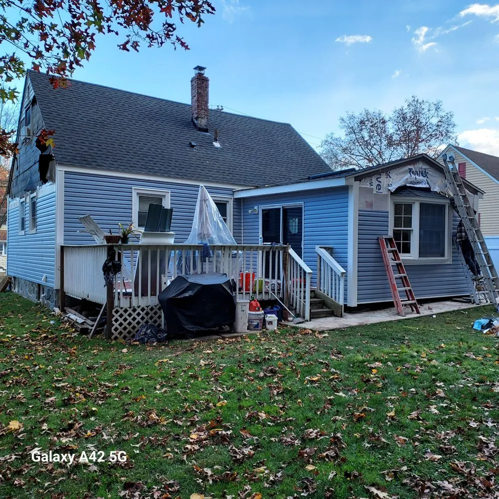 Slide of RC Roofing and Siding