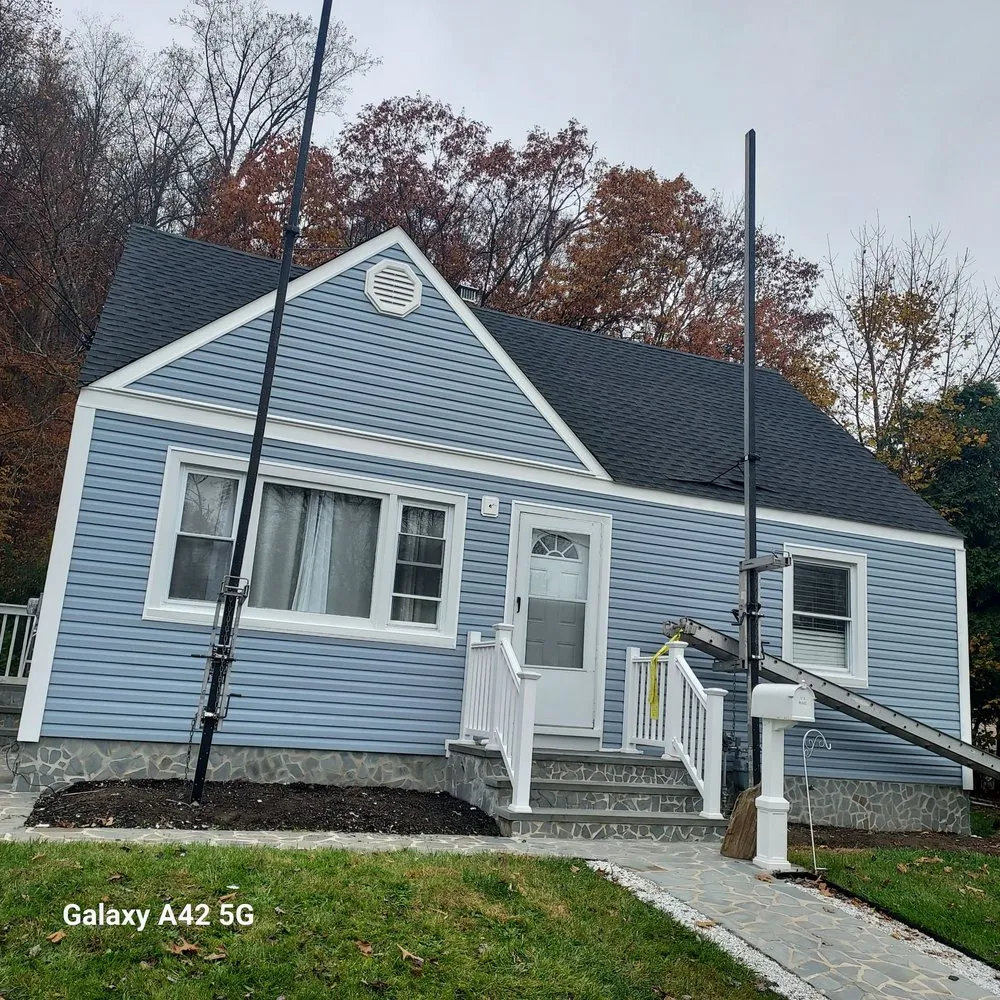 Slide of RC Roofing and Siding