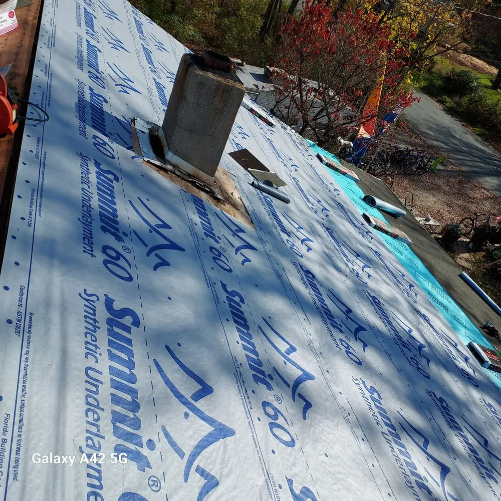 Slide of RC Roofing and Siding