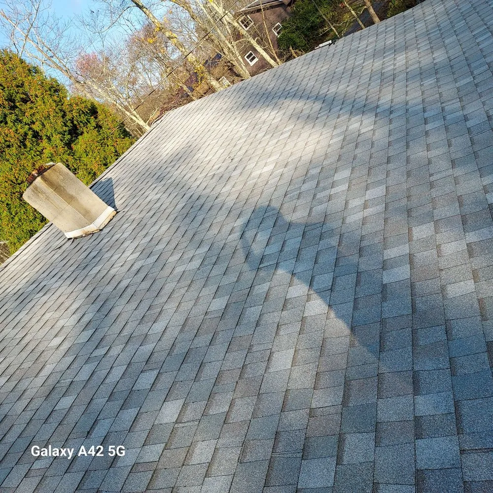 Slide of RC Roofing and Siding