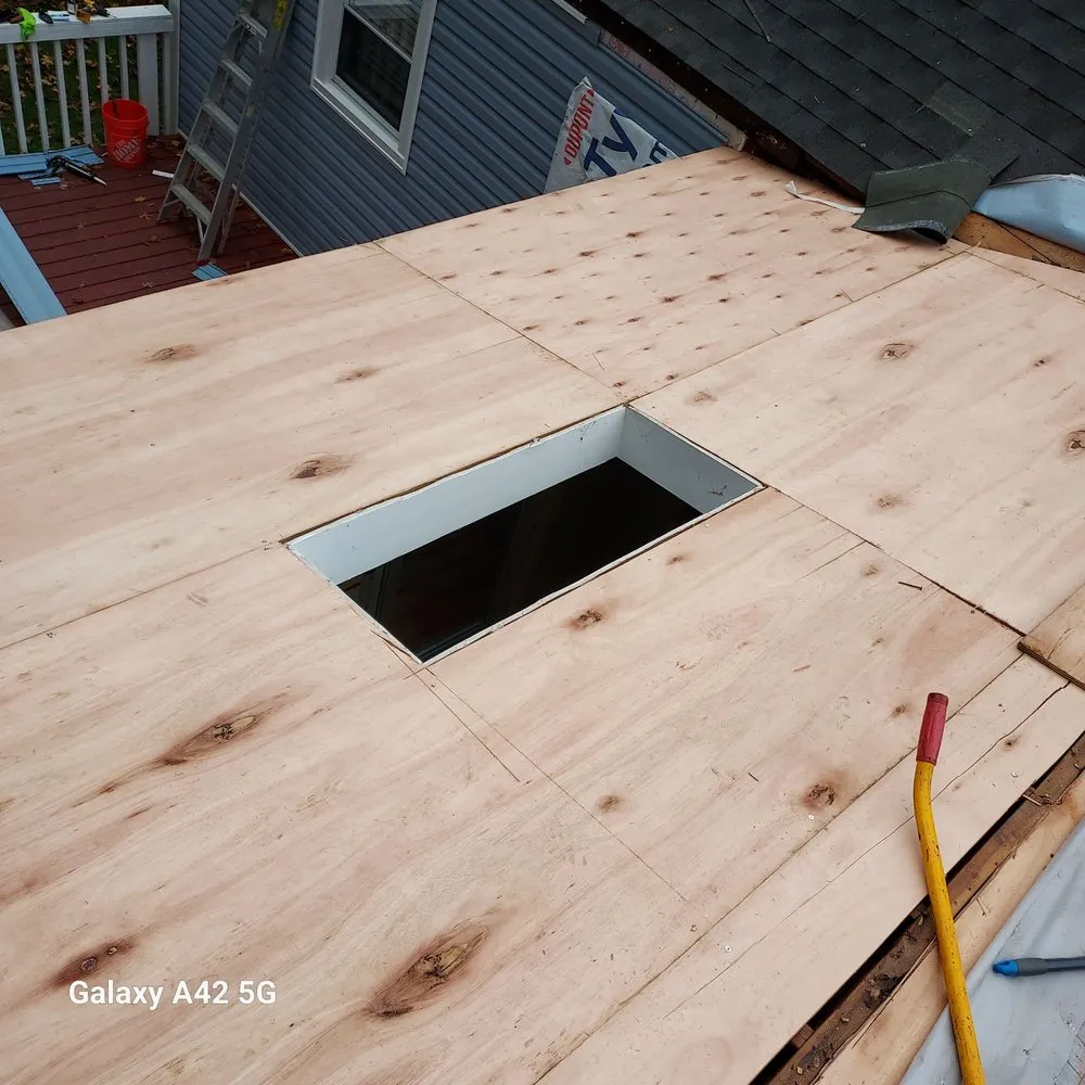 Slide of RC Roofing and Siding