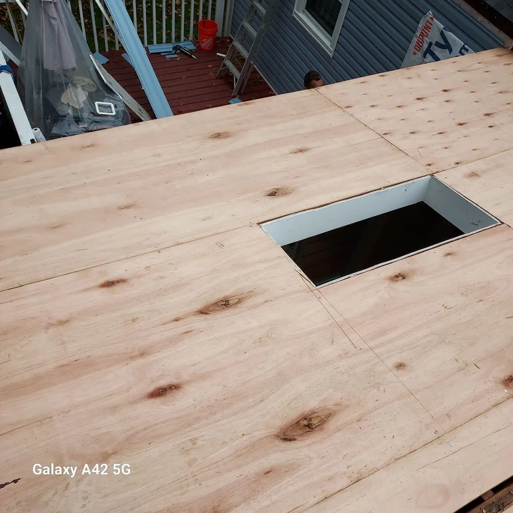 Slide of RC Roofing and Siding