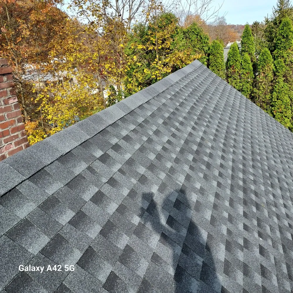 Slide of RC Roofing and Siding