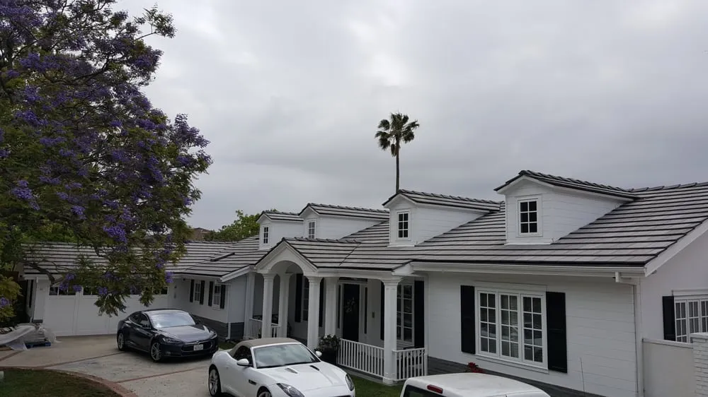 Slide of RC Roofing Co