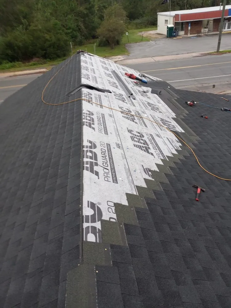 Slide of RCM Roofers