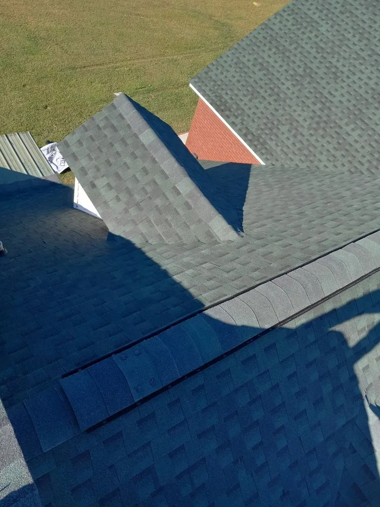 Slide of RCM Roofers