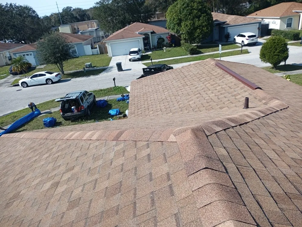 Slide of RCX Roofing