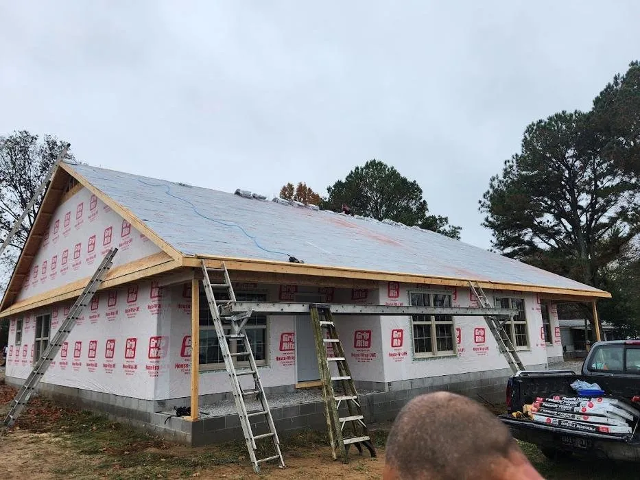 Slide of R&D Roofing