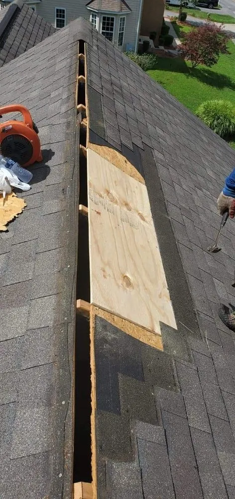 Slide of RD Roofing Repair