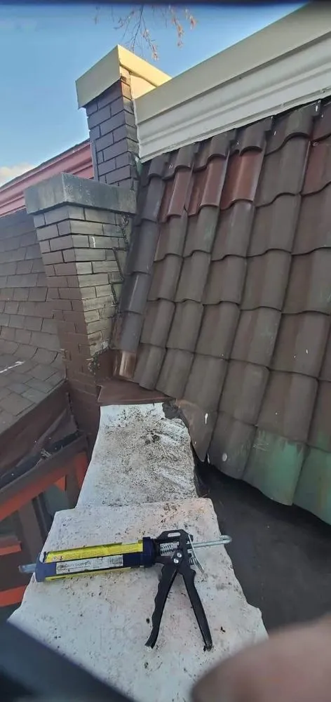 Slide of RD Roofing Repair