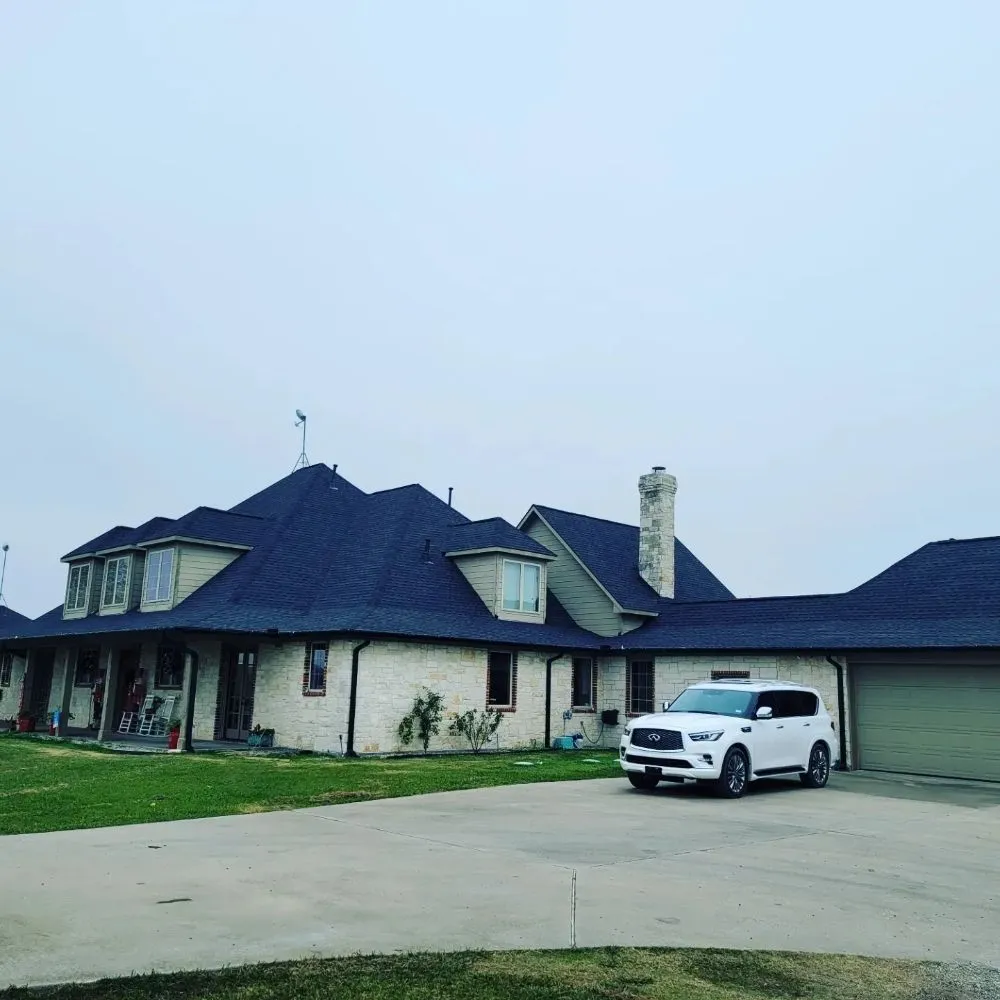 Slide of RE Roofing and Construction