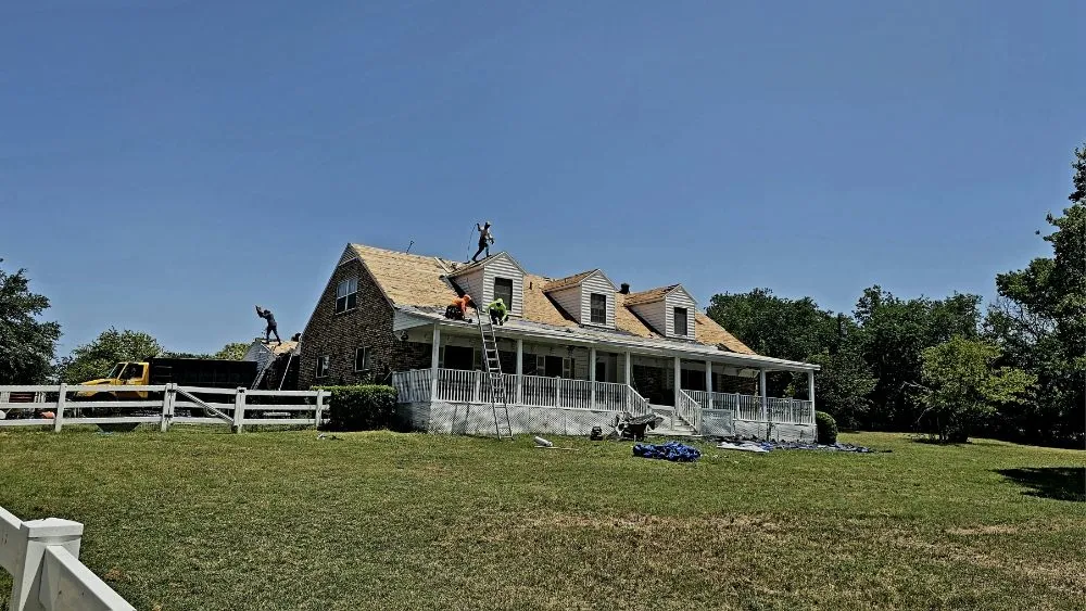 Slide of RE Roofing and Construction