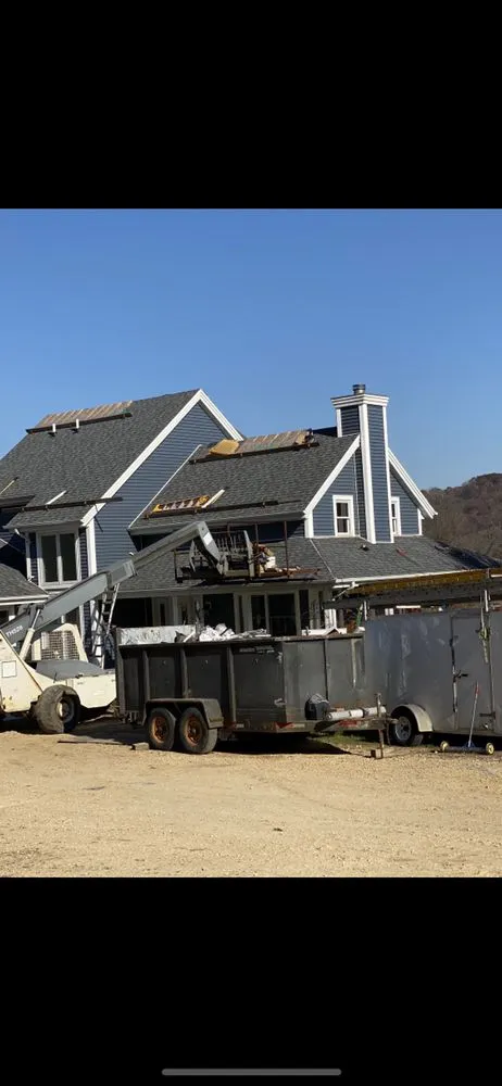 Slide of Ready Roofing & Siding