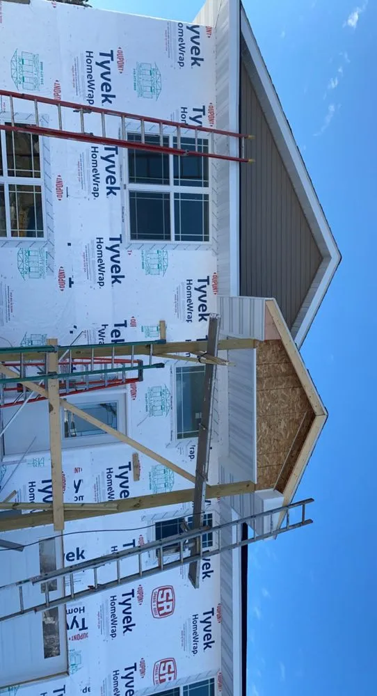 Slide of Ready Roofing & Siding