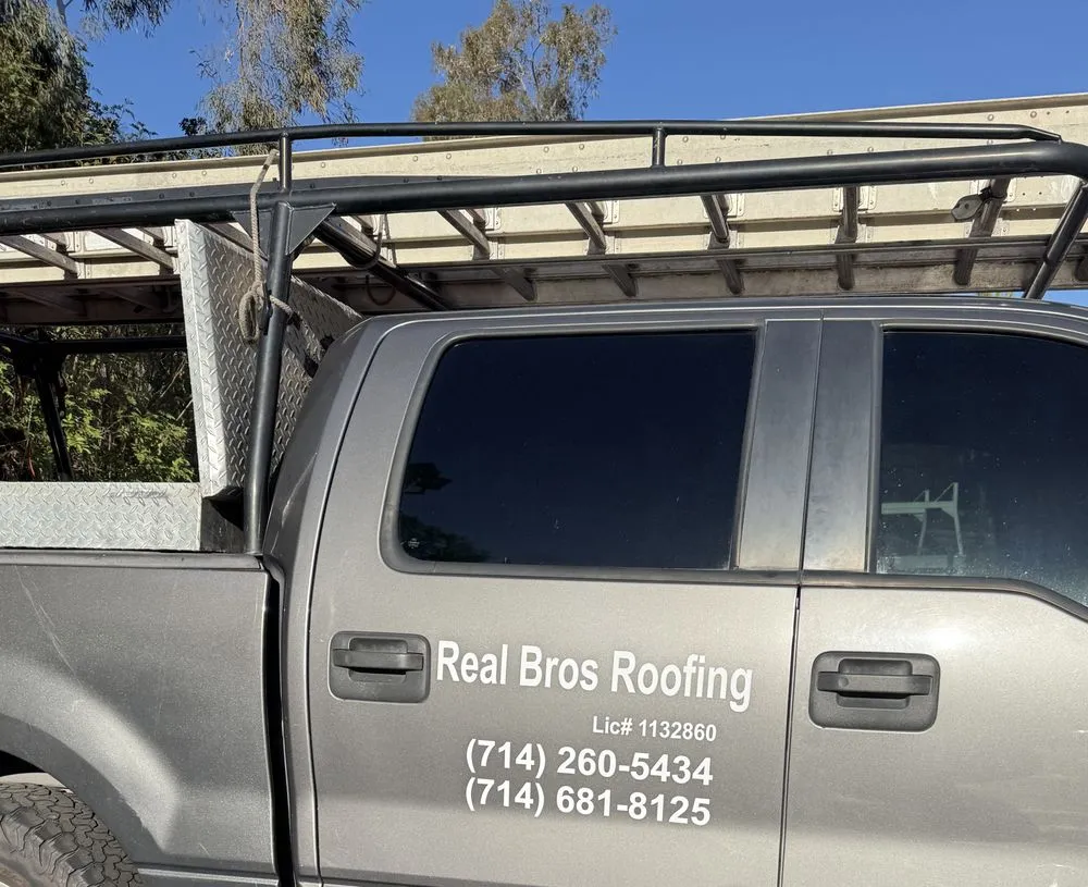 Slide of Real Bros Roofing