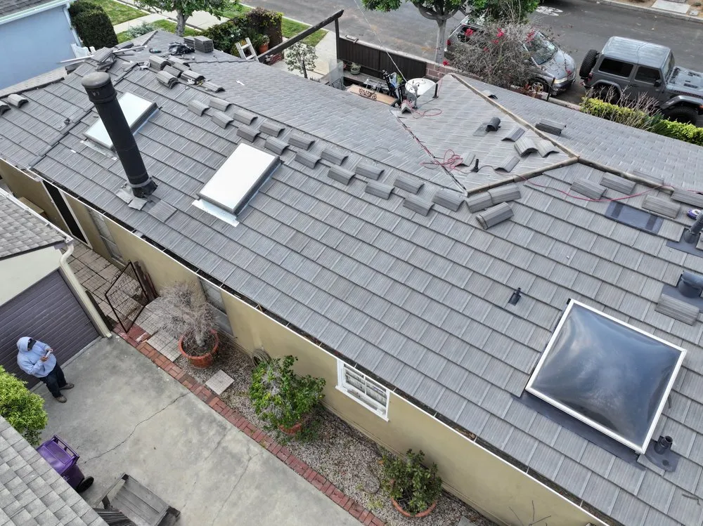 Slide of Real Bros Roofing