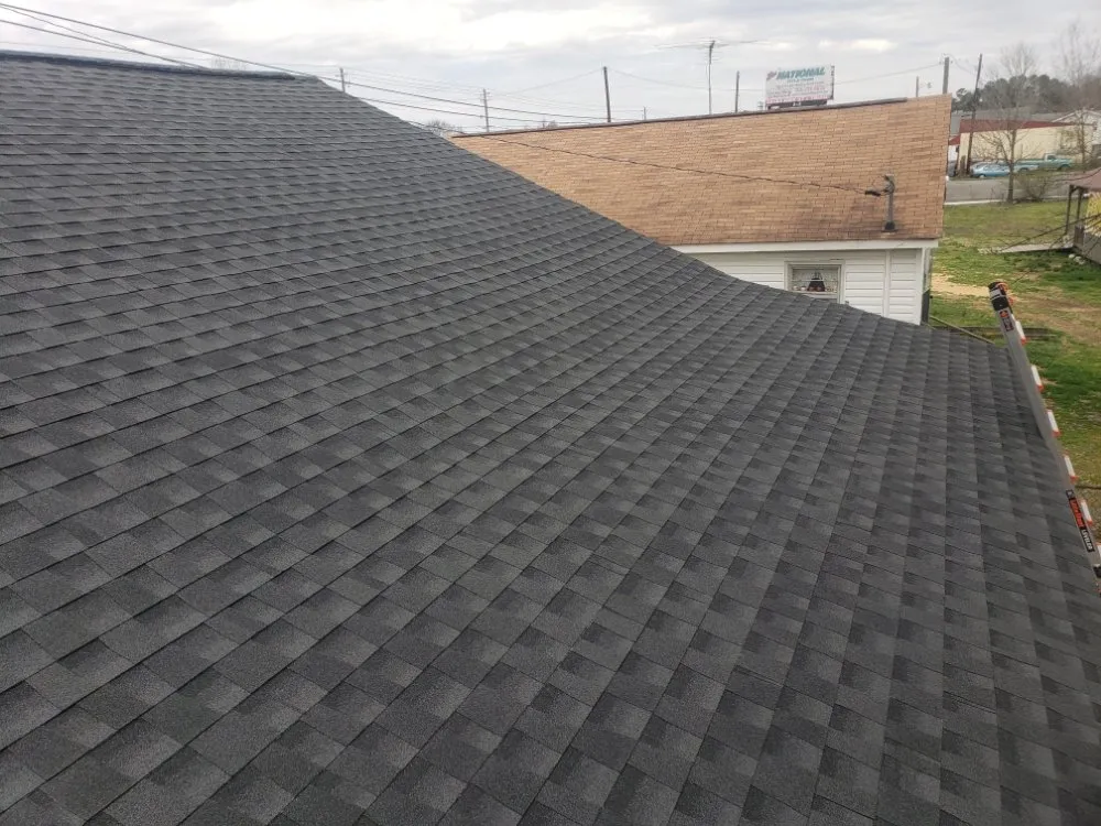 Slide of Real Deal Roofing
