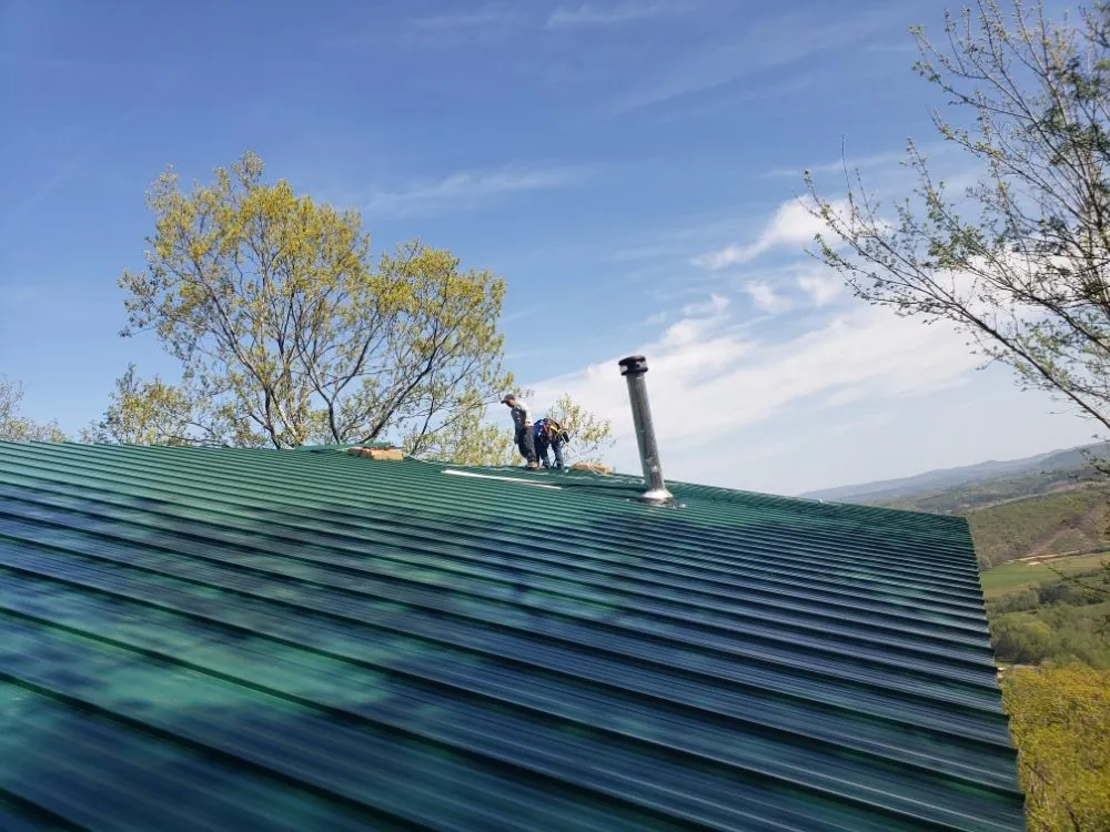 Slide of Real Deal Roofing