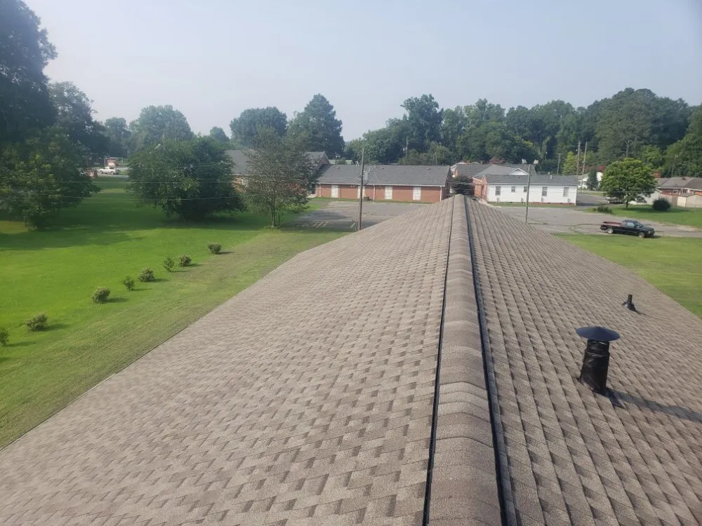 Slide of Real Deal Roofing