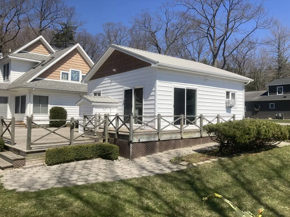 Expert shingle roofing service in Walkerville, MI by Real Remodeling