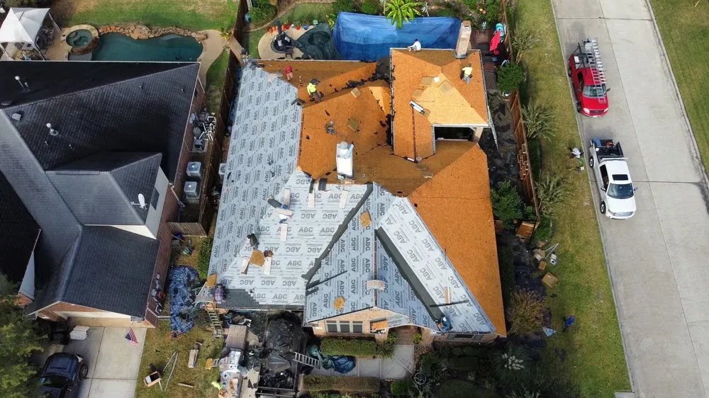 Slide of REAL Roofing and Construction