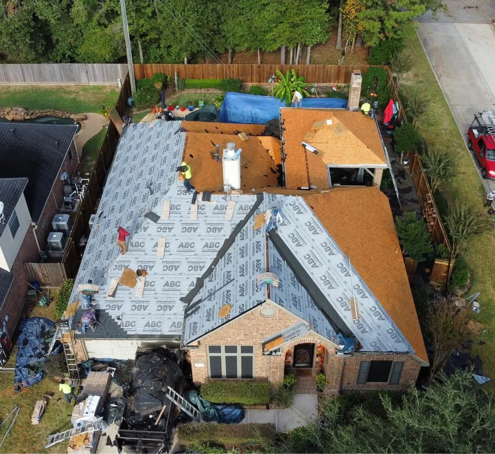 Slide of REAL Roofing and Construction