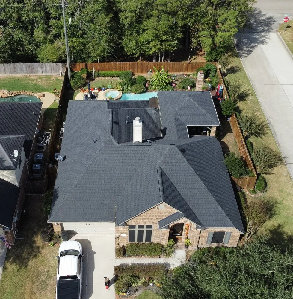 Slide of REAL Roofing and Construction