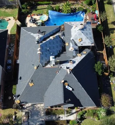 REAL Roofing and Construction Logo