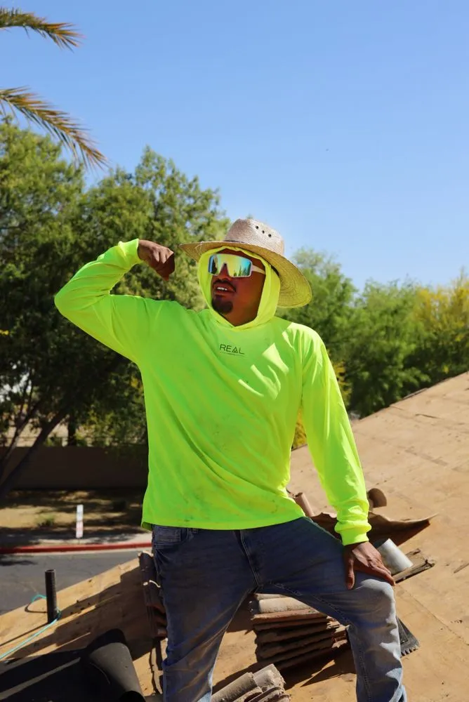 Slide of Real Roofing