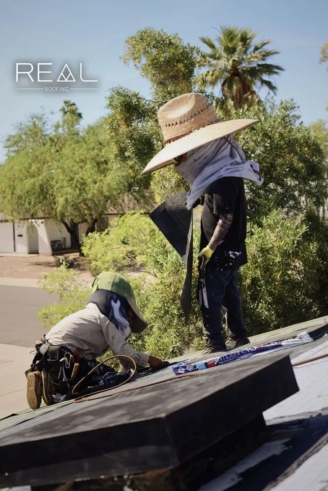 Slide of Real Roofing