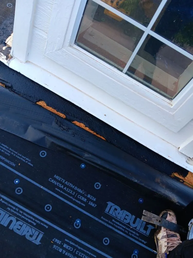 Slide of Real Roofing