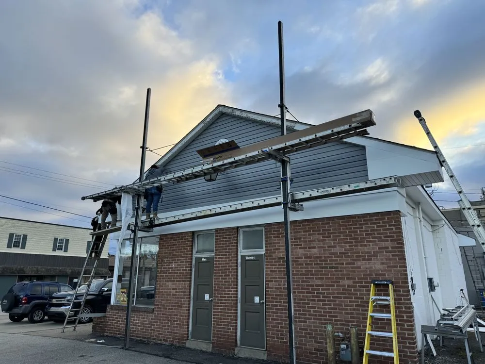 Slide of Real Roofing