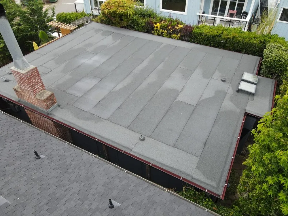 Slide of Real Roofing