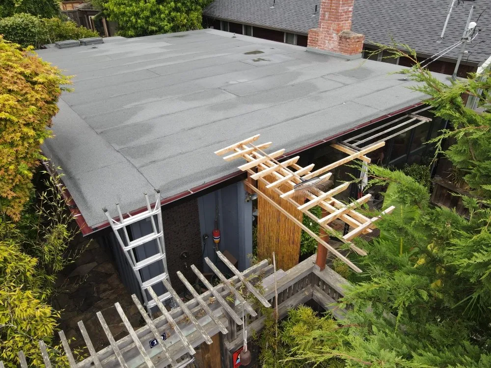 Slide of Real Roofing