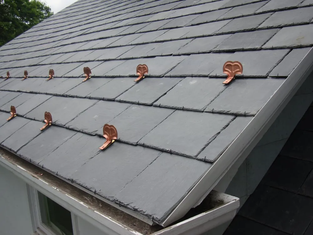 Slide of Reality Roofing Inc