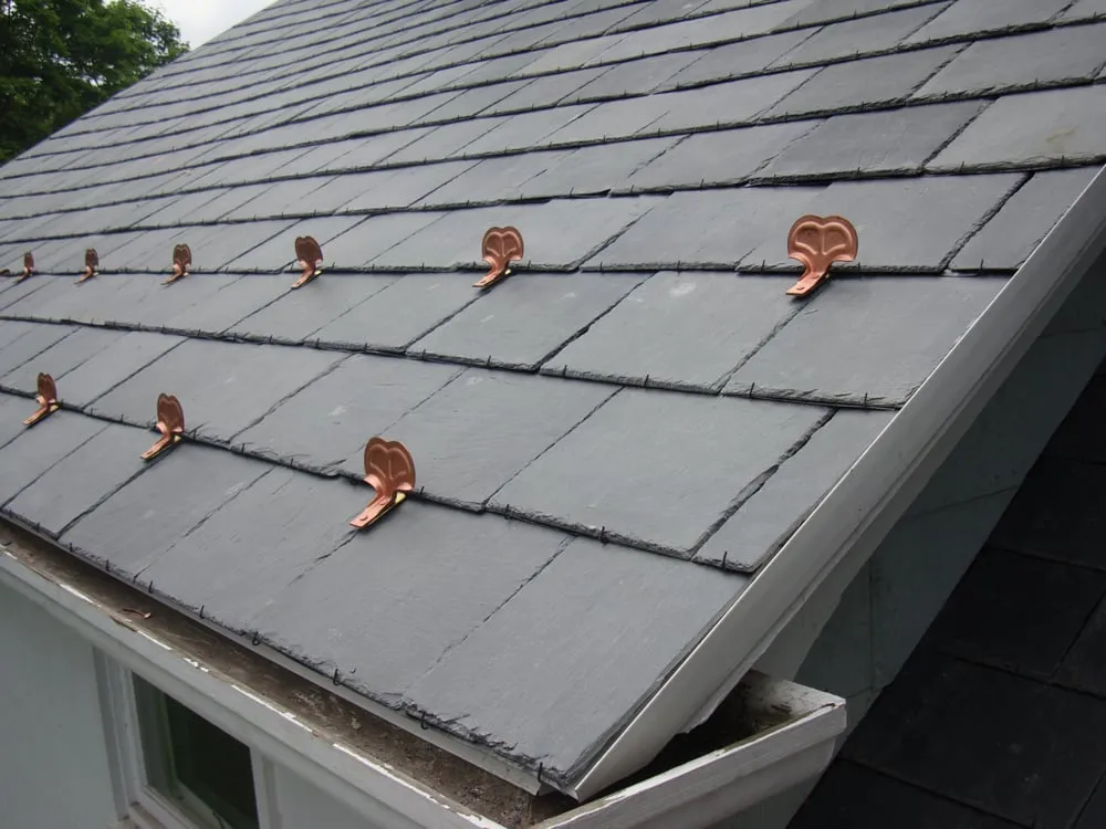 Slide of Reality Roofing Inc