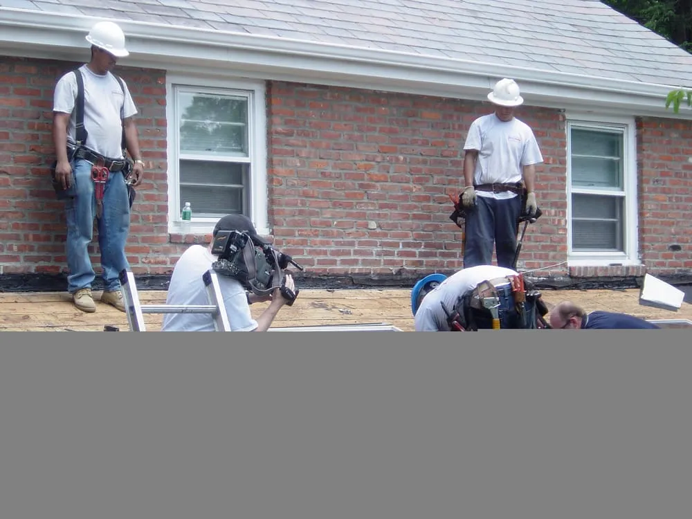 Slide of Reality Roofing Inc