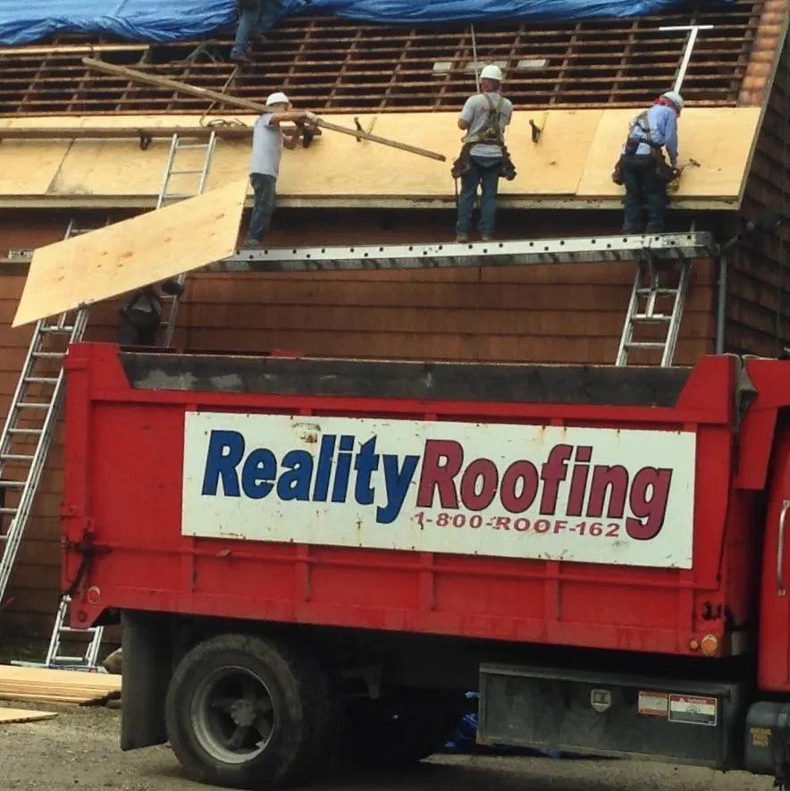 Slide of Reality Roofing Inc