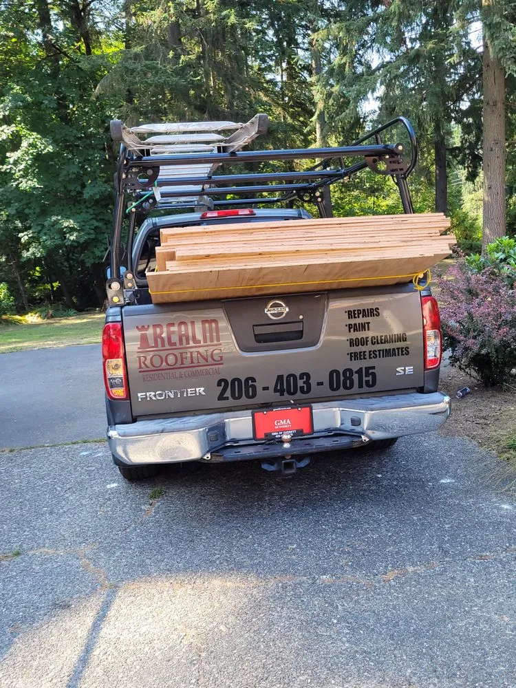 Slide of Realm Roofing