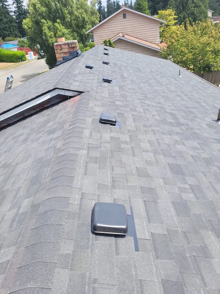 Slide of Realm Roofing