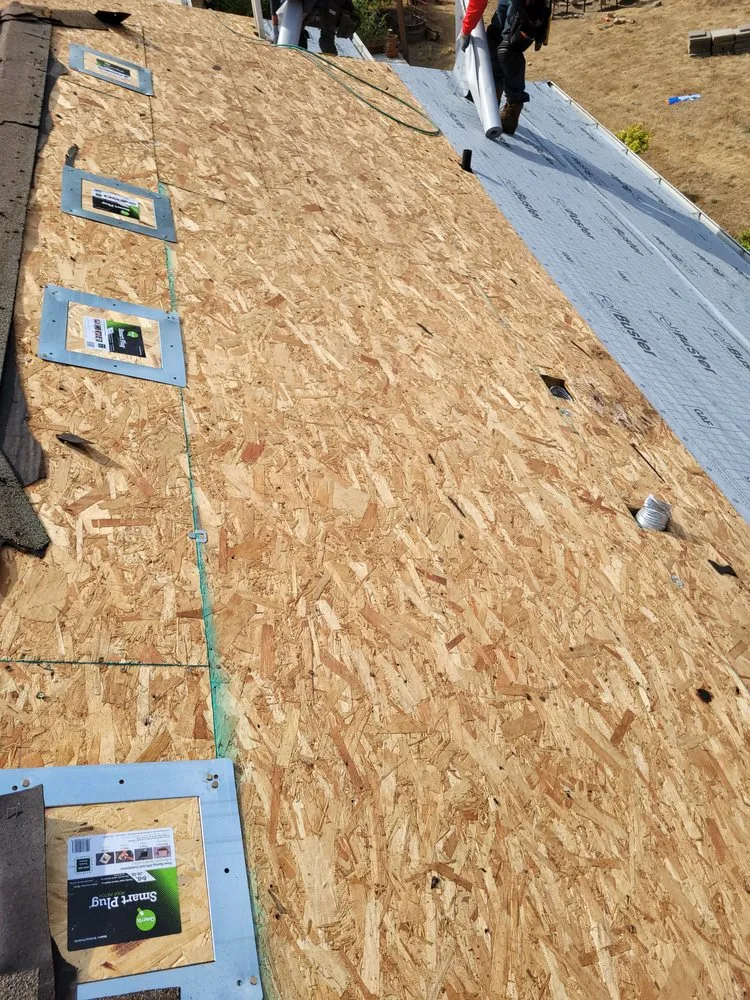 Slide of Realm Roofing