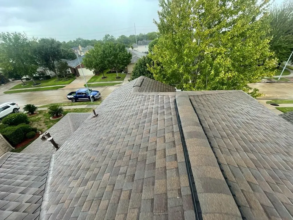 Slide of Reborn Roofing & Construction