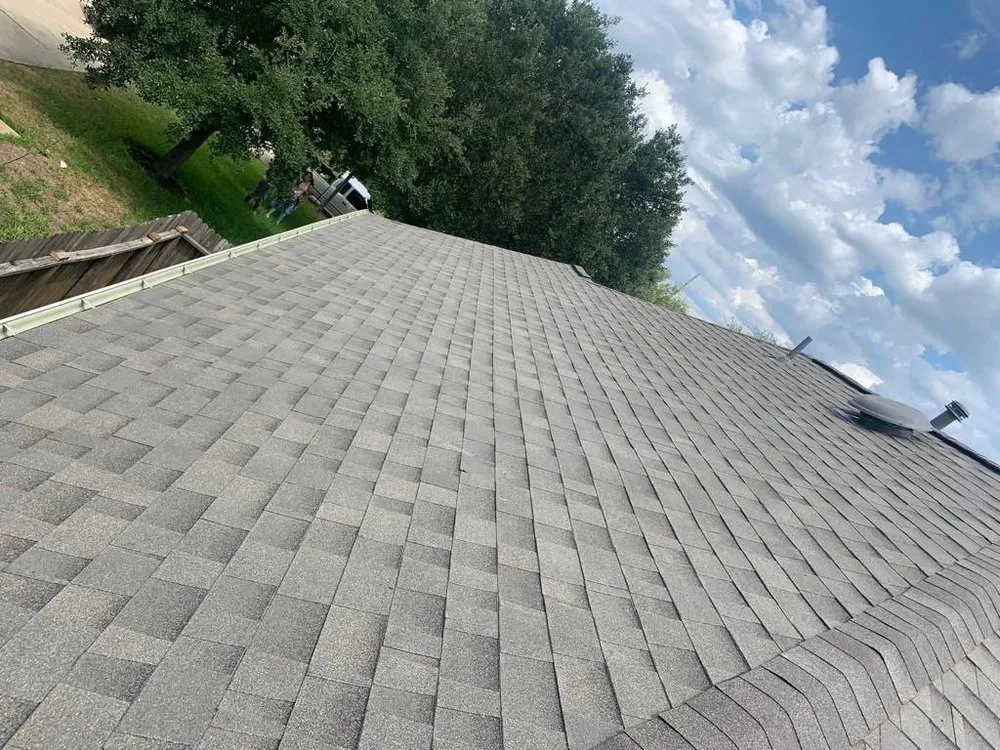 Slide of Reborn Roofing & Construction