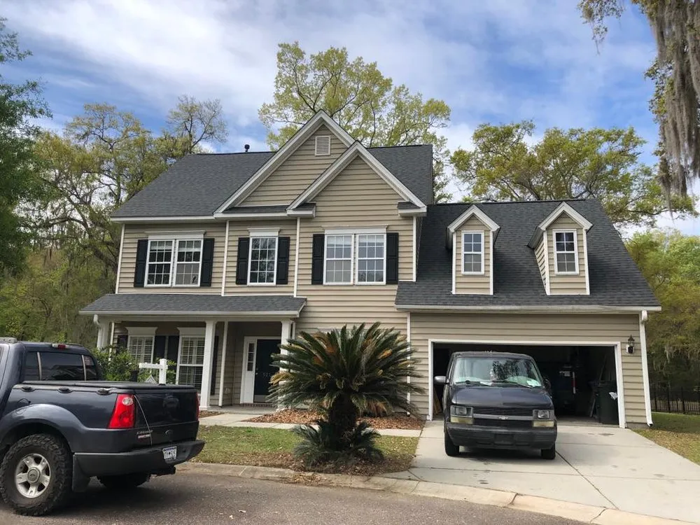 Slide of Reborn Roofing & Construction