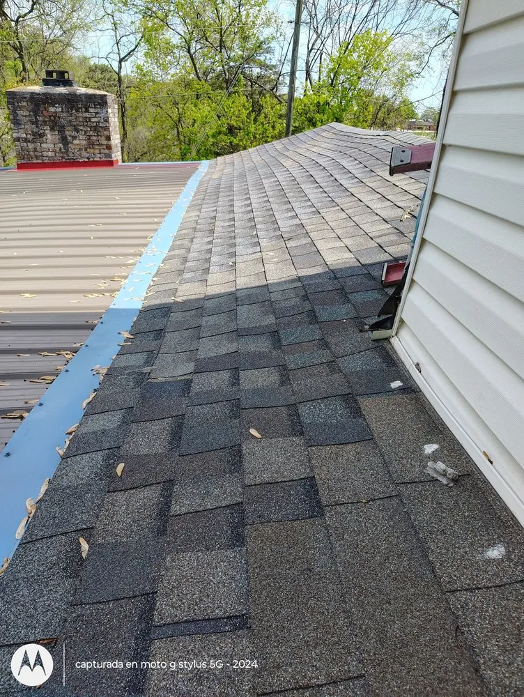 Slide of Recinos Roofing & Remodeling