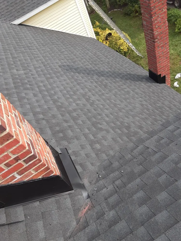 Slide of Recinos Siding Contractor