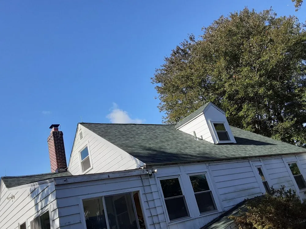 Slide of Recinos Siding Contractor