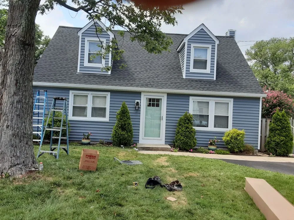 Slide of Recinos Siding Contractor