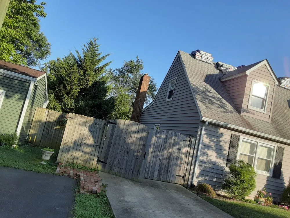 Slide of Recinos Siding Contractor